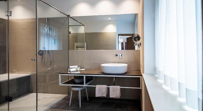 Dolce Vita Alpina - Posthotel in Innichen, Badezimmer